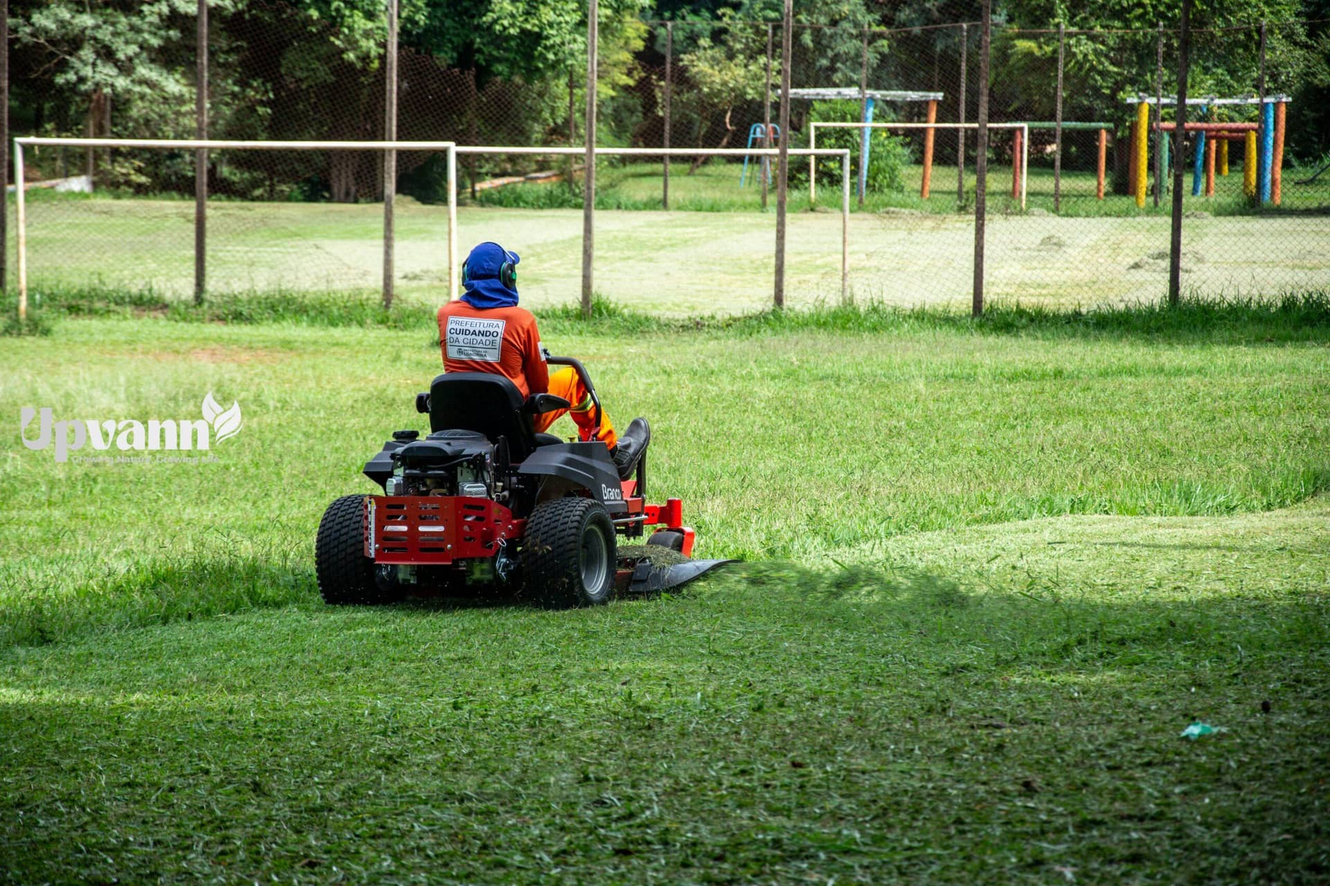 pexels photo 20534858 20534858 Individual operating a riding lawnmower on a grassy field in a recreational park, Londrina, Brazil.